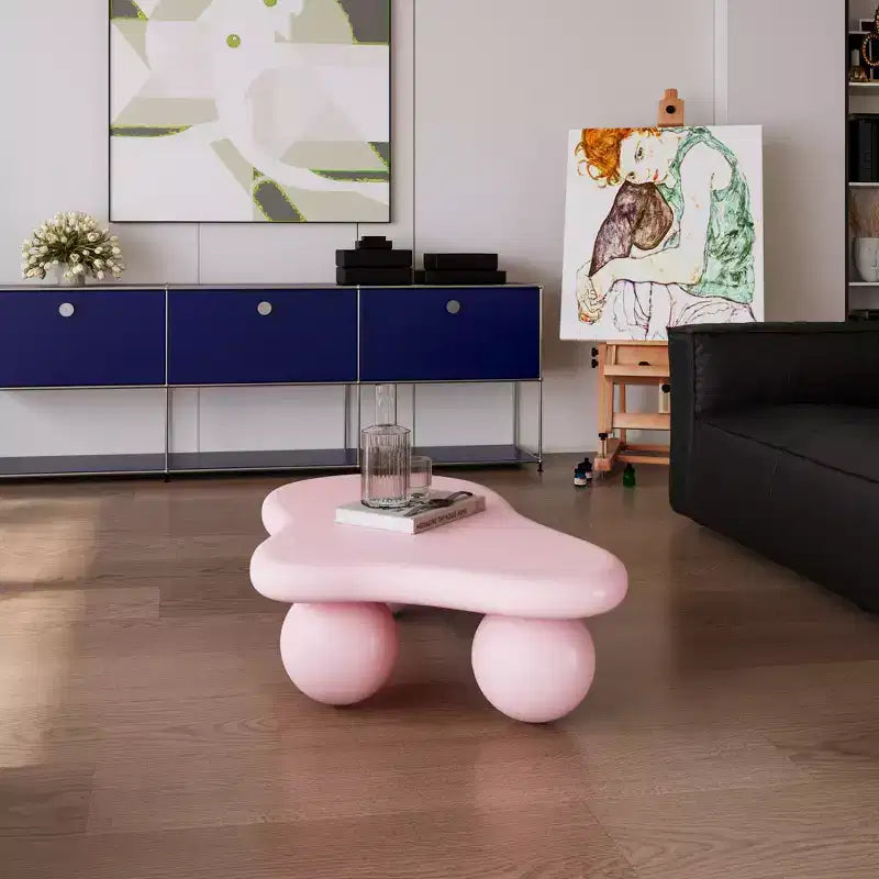Table basse rose en forme de nuage avec pieds boules, 1 personne