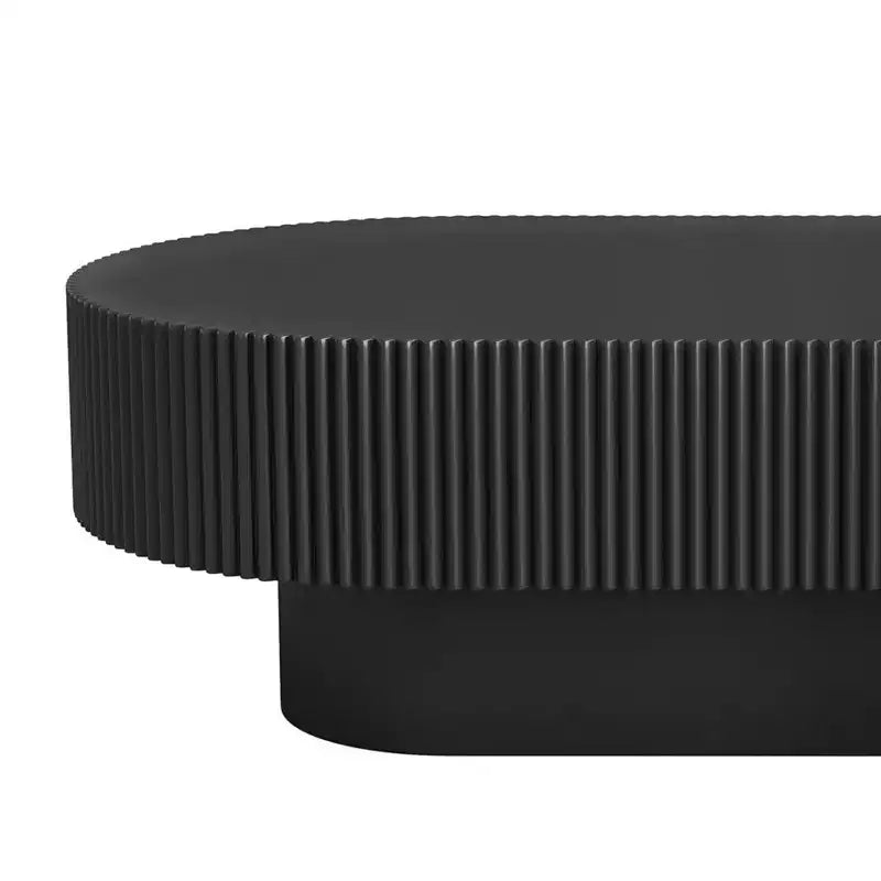 Table basse ovale avec piètement cannelé pour le salon
