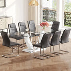 Ensemble de salle à manger moderne avec table en verre trempé, piètement en U à motif marbre et chaises rembourrées en similicuir.