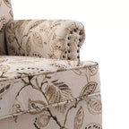 Fauteuil rembourré en bois avec motif floral, accoudoirs à panneaux et dossier en forme de bosse de chameau.