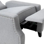 Fauteuil inclinable avec pochette arrière et garniture de clous décoratifs