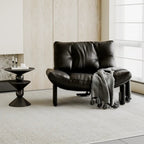 Fauteuil d'appoint contemporain en chenille noire capitonnée sans accoudoirs