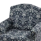 Fauteuil rembourré en bois avec motif floral, accoudoirs à panneaux et dossier en forme de bosse de chameau.