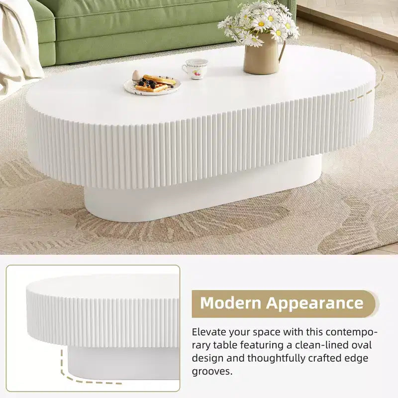Table basse ovale avec piètement cannelé pour le salon