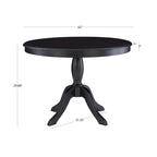 Table ronde à pied central en bois massif
