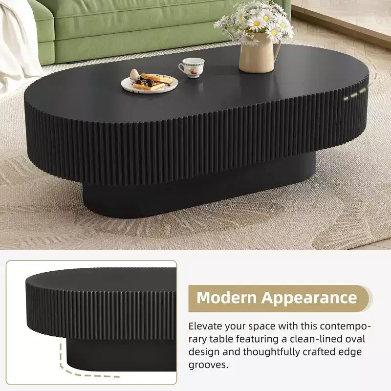 Table basse ovale avec piètement cannelé pour le salon