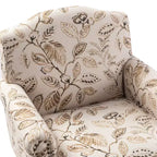 Fauteuil rembourré en bois avec motif floral, accoudoirs à panneaux et dossier en forme de bosse de chameau.