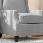 Fauteuil inclinable avec pochette arrière et garniture de clous décoratifs