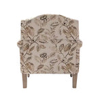 Fauteuil rembourré en bois avec motif floral, accoudoirs à panneaux et dossier en forme de bosse de chameau.